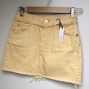 pastel yellow denim skirt